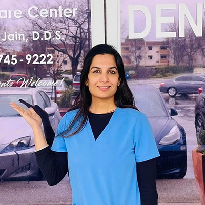Dentist Bhumika Jain Smiling Outside Of Clinic